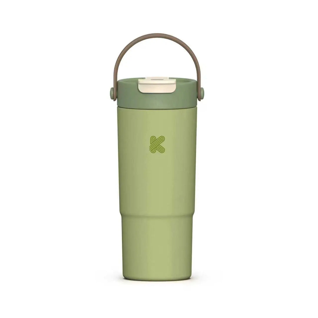 A tall insulated travel tumbler in sage green with a matching green lid, a brown carrying loop handle, and a small &